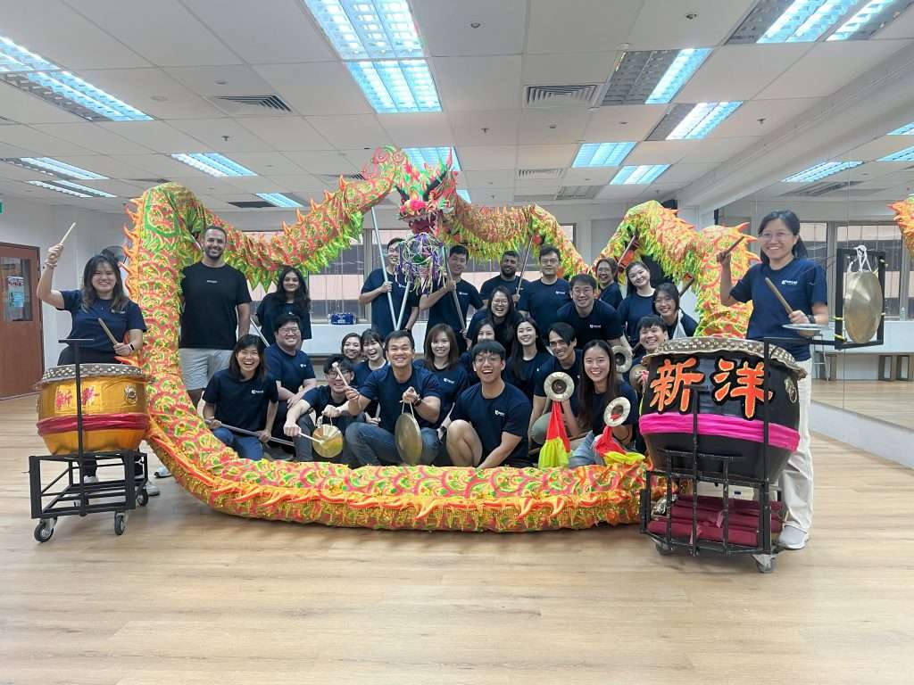 Team bonding learning dragon dance and music ceremony